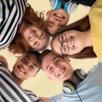 Smiling youth in a circle.